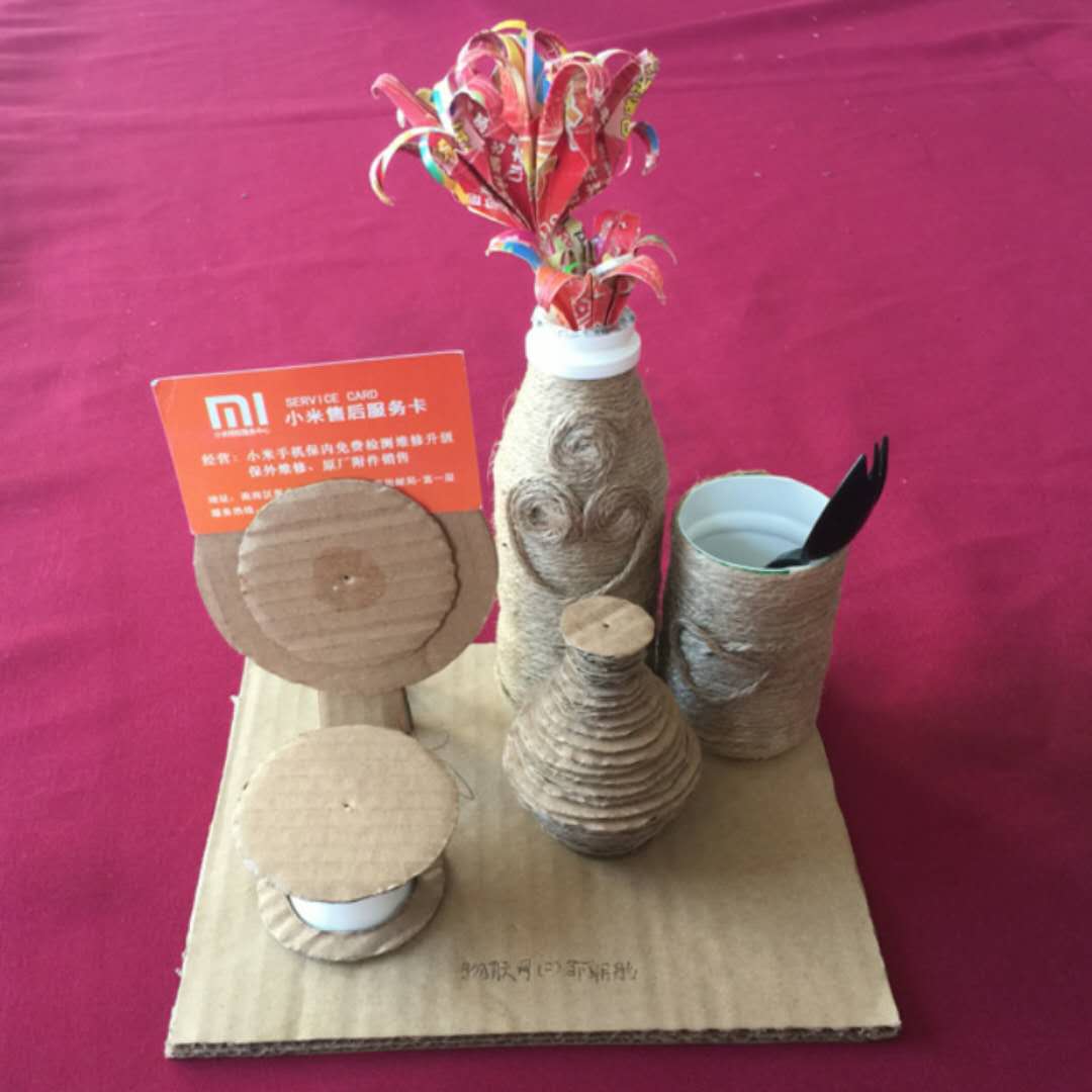 1523508830526063.jpg 图片1:一纸花开多功能笔筒.jpg